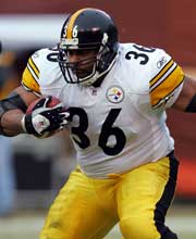 Pro Football Hall of Famer Jerome Bettis wearing number 36 for the Pittsburgh Steelers rushing the ball