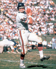 Pro Football Hall of Famer Mike Ditka wearing number 89 for the Chicago Bears catching a ball