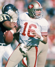 Pro Football Hall of Famer Joe Montana wearing number 16 for the San Francisco 49ers dropping back for a pass