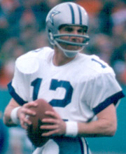 Pro Football Hall of Famer Roger Staubach dropping back for a pass with the Dallas Cowboys