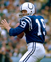 Pro Football Hall of Famer Johnny Unitas wearing number 19 for the Baltimore Colts throwing a pass